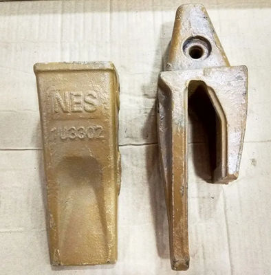 1U3302 Denti a secchio per escavatori con porta denti